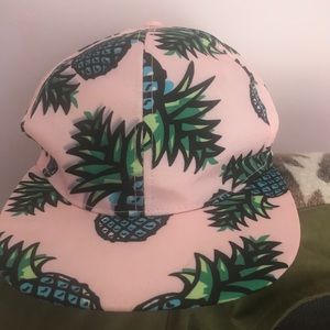 Pink pineapple trucker hat